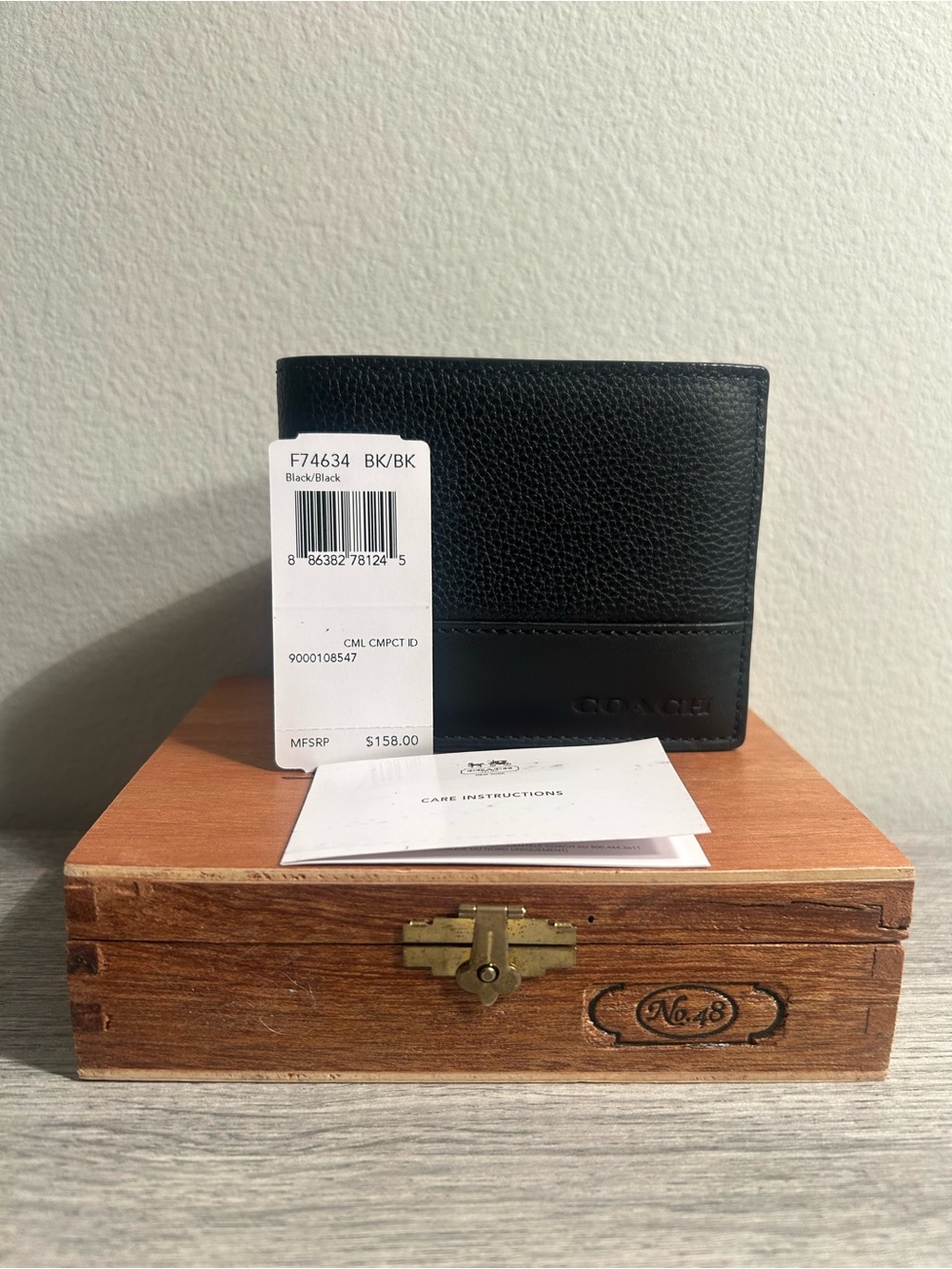 Coach Black Pebbled Leather Compact ID Wallet F74634 NWT.